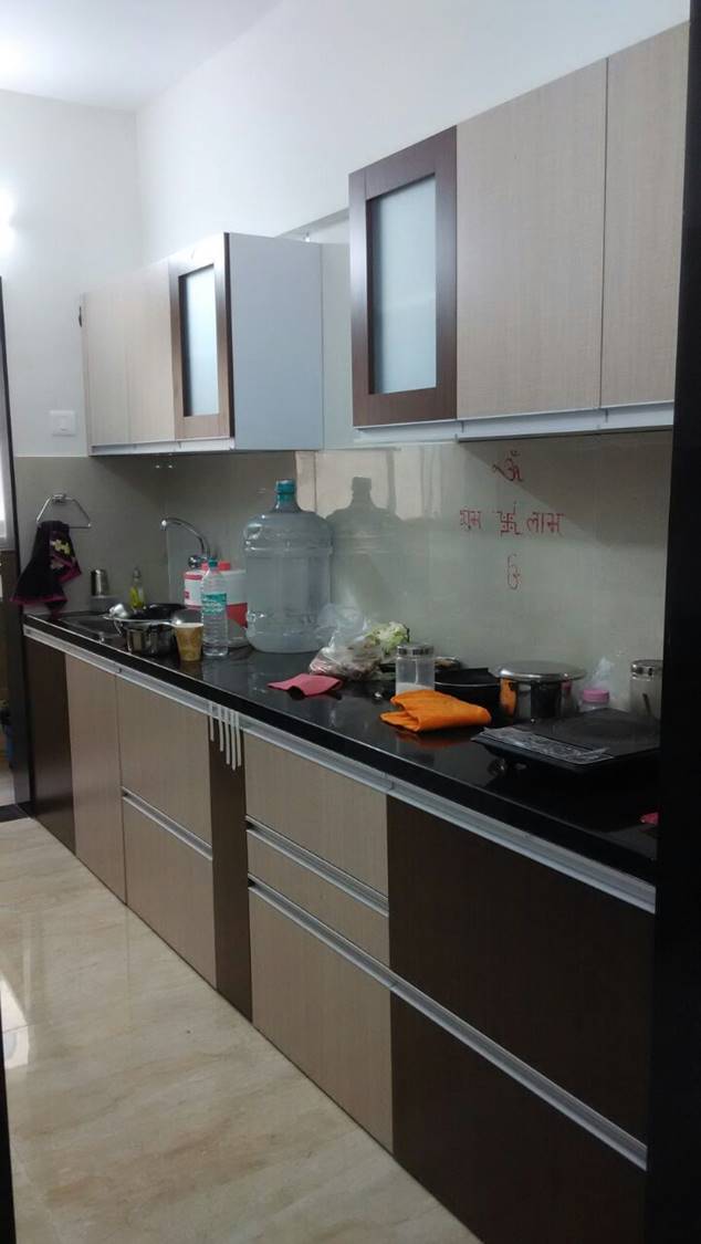 Modern kitchen island with integrated storage and seating area demonstrating functional design